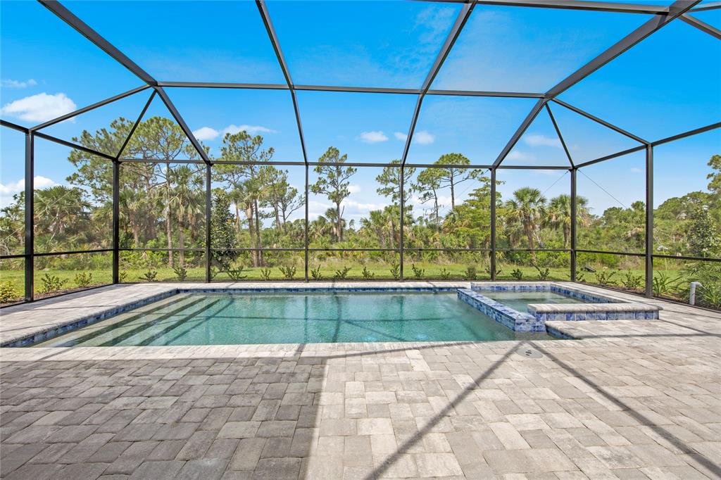 7161 Inlet Isles Lakewood Ranch, FL 34202 - Photo 29 of 29 a view of a patio with a yard