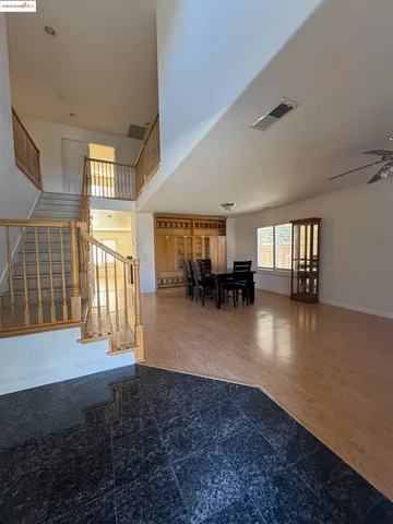 a view of livingroom with furniture and floor to ceiling window