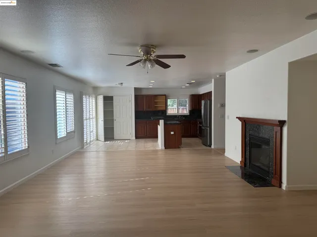 a view of a livingroom with furniture and window