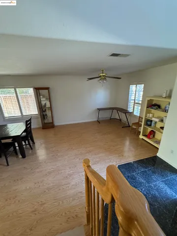 a view of a living room and dining room