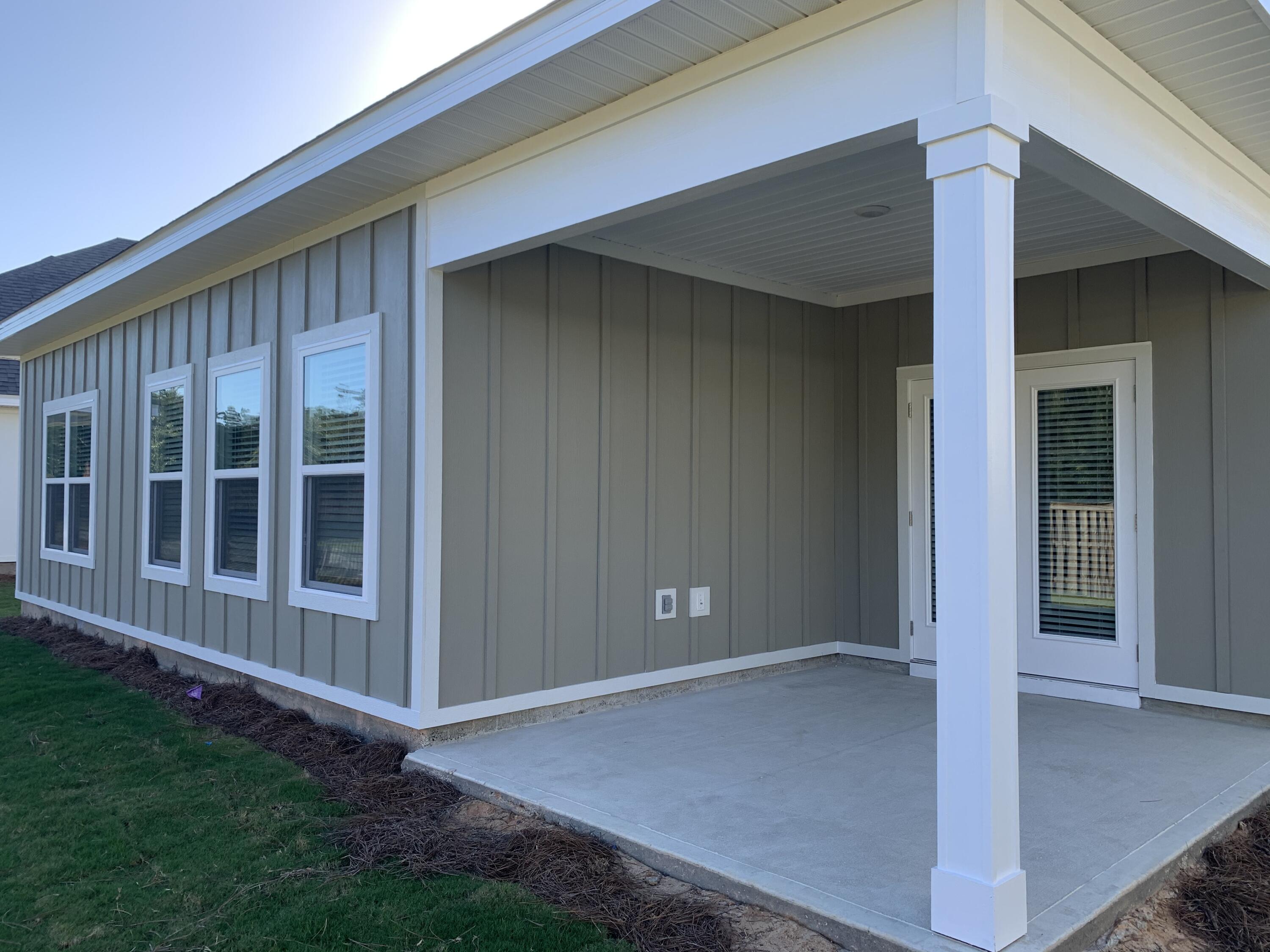 491 Lightning Bug Lane, Unit LOT 11 Freeport, FL 32439 - Photo 19 of 34 an empty room with windows