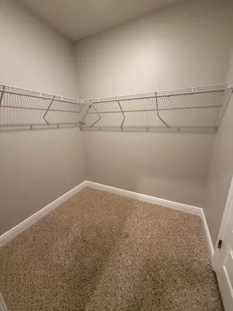 a view of a room with racks on the wall