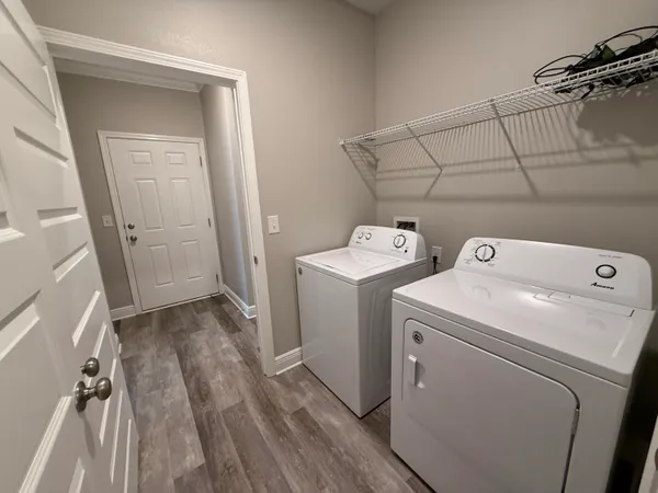 a utility room with dryer and washer