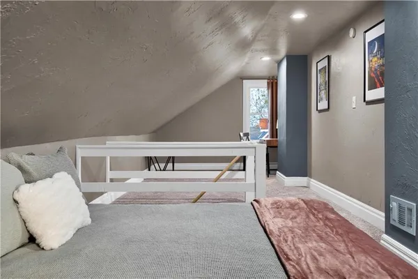 a view of a livingroom with furniture and window