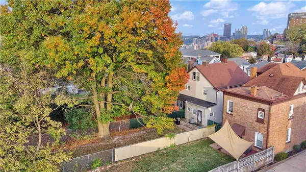 a view of a city with tall buildings