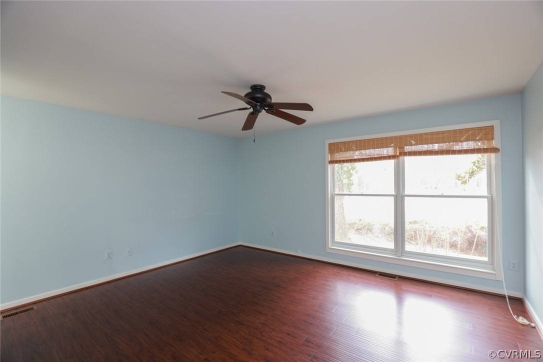 3024 3 Bridges Road Midlothian, VA 23112 - Photo 19 of 50 a view of a room with wooden floor and windows