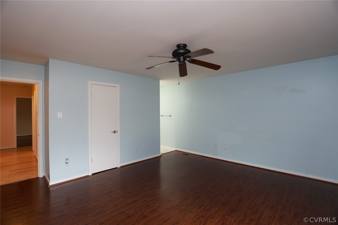 3024 3 Bridges Road Midlothian, VA 23112 - Photo 21 of 50 a view of room with wooden floor and ceiling fan