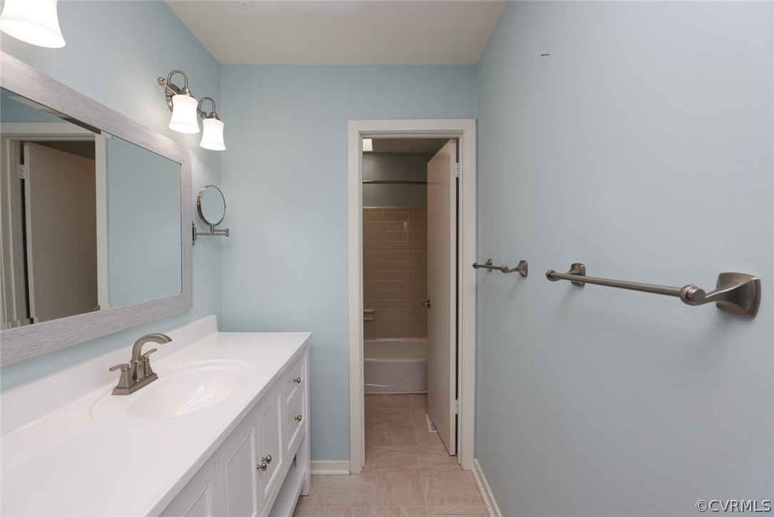 3024 3 Bridges Road Midlothian, VA 23112 - Photo 25 of 50 a bathroom with a sink double vanity and a mirror