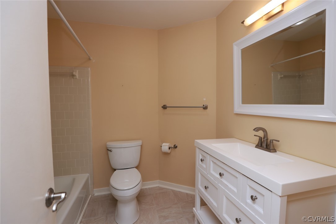 3024 3 Bridges Road Midlothian, VA 23112 - Photo 27 of 50 a bathroom with a toilet sink and mirror