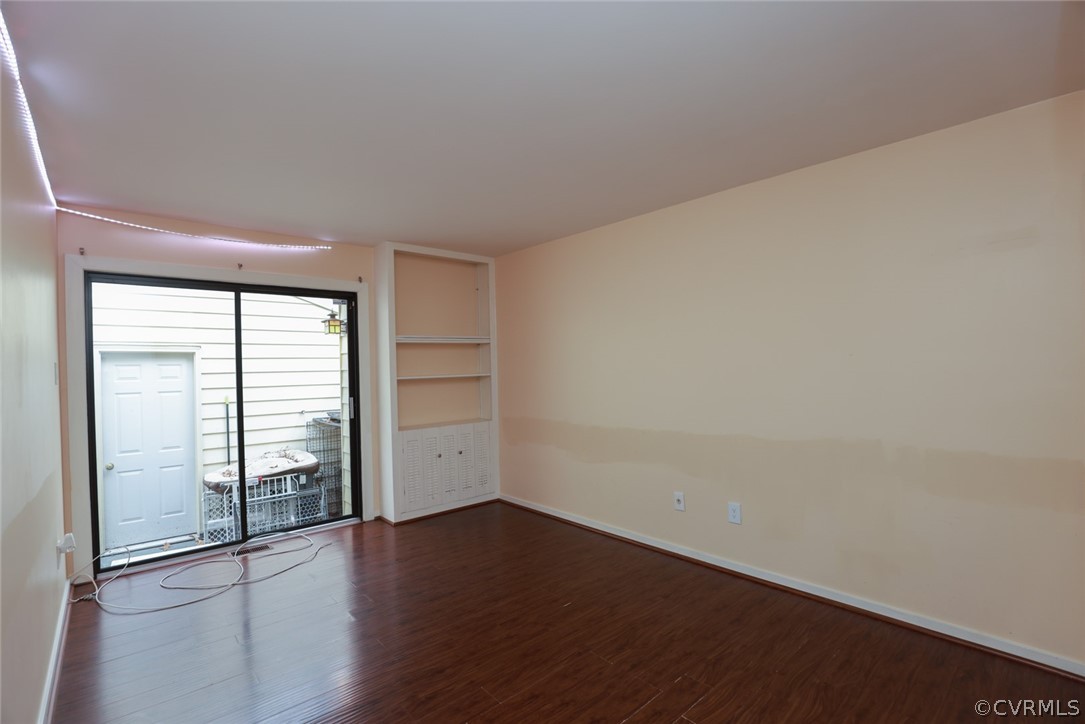 3024 3 Bridges Road Midlothian, VA 23112 - Photo 30 of 50 an empty room with wooden floor and windows