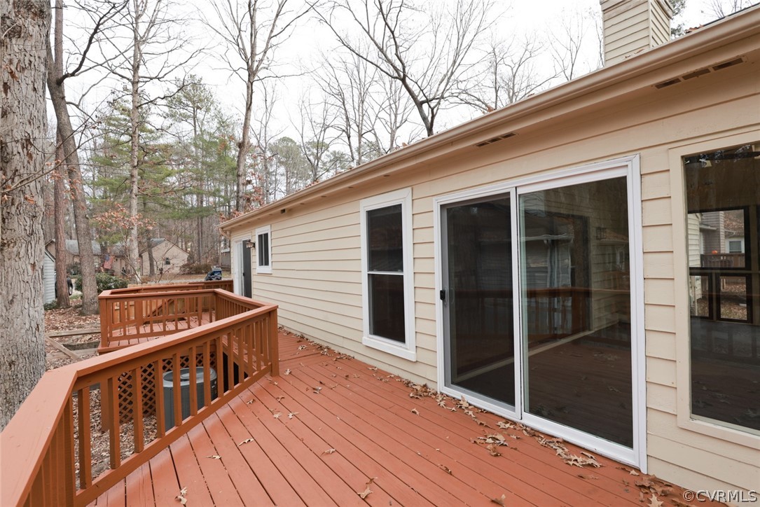 3024 3 Bridges Road Midlothian, VA 23112 - Photo 36 of 50 a view of a wooden deck with a backyard