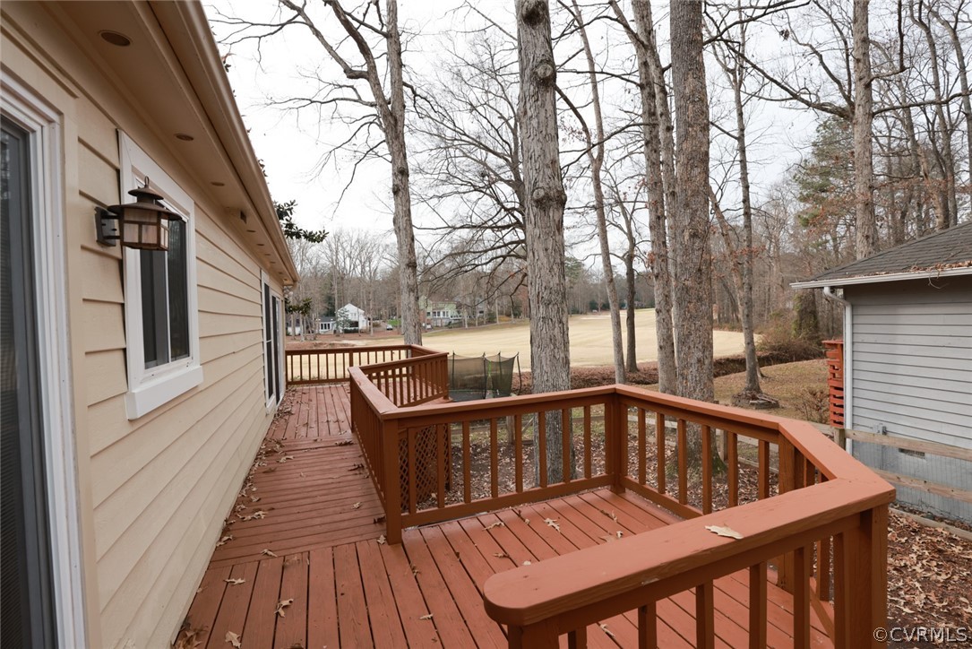 3024 3 Bridges Road Midlothian, VA 23112 - Photo 37 of 50 a view of a wooden deck with furniture and trees