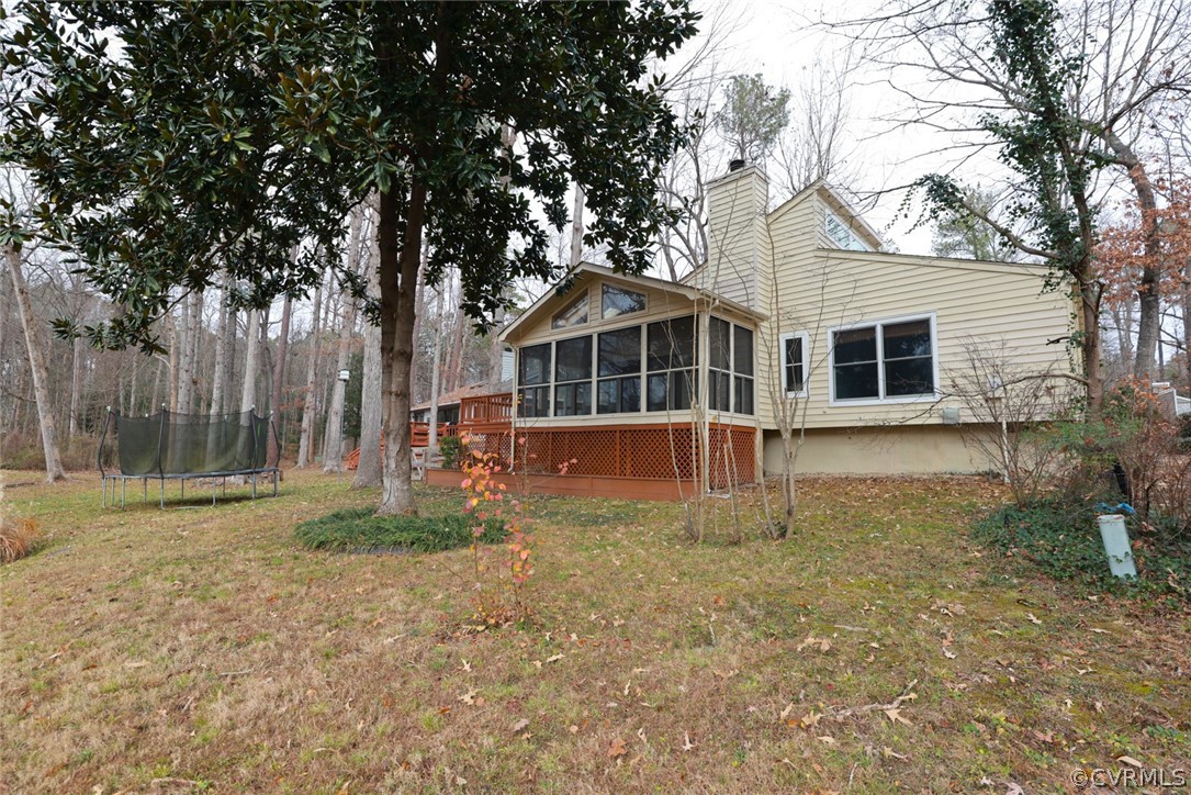 3024 3 Bridges Road Midlothian, VA 23112 - Photo 41 of 50 a white house that has a tree in front of it