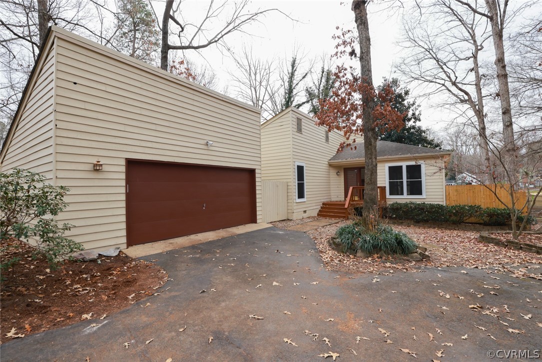 3024 3 Bridges Road Midlothian, VA 23112 - Photo 50 of 50 a front view of a house with a yard and garage