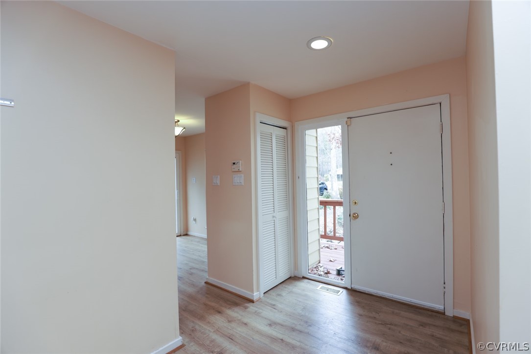 3024 3 Bridges Road Midlothian, VA 23112 - Photo 5 of 50 a view of an empty room with wooden floor