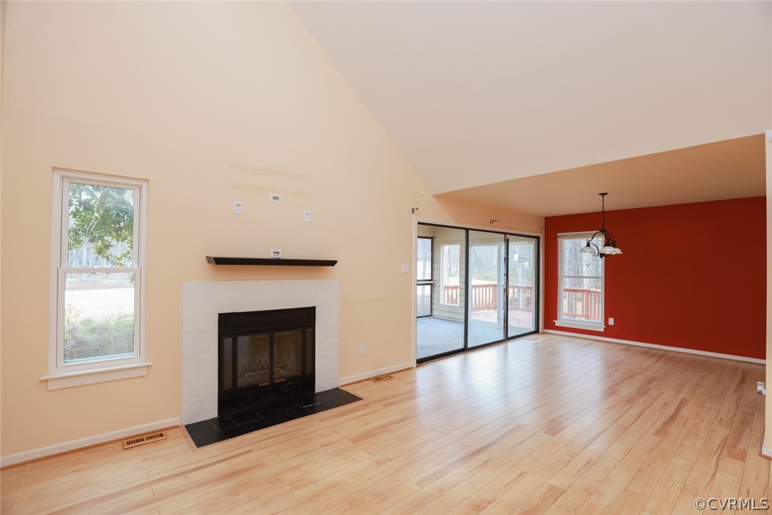 3024 3 Bridges Road Midlothian, VA 23112 - Photo 8 of 50 a view of an empty room with wooden floor and a window