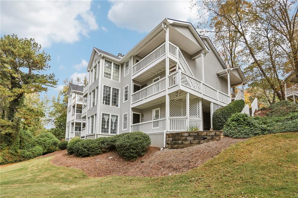801 Countryside Place Smyrna, GA 30080 - Photo 23 of 34 a front view of a house with a yard