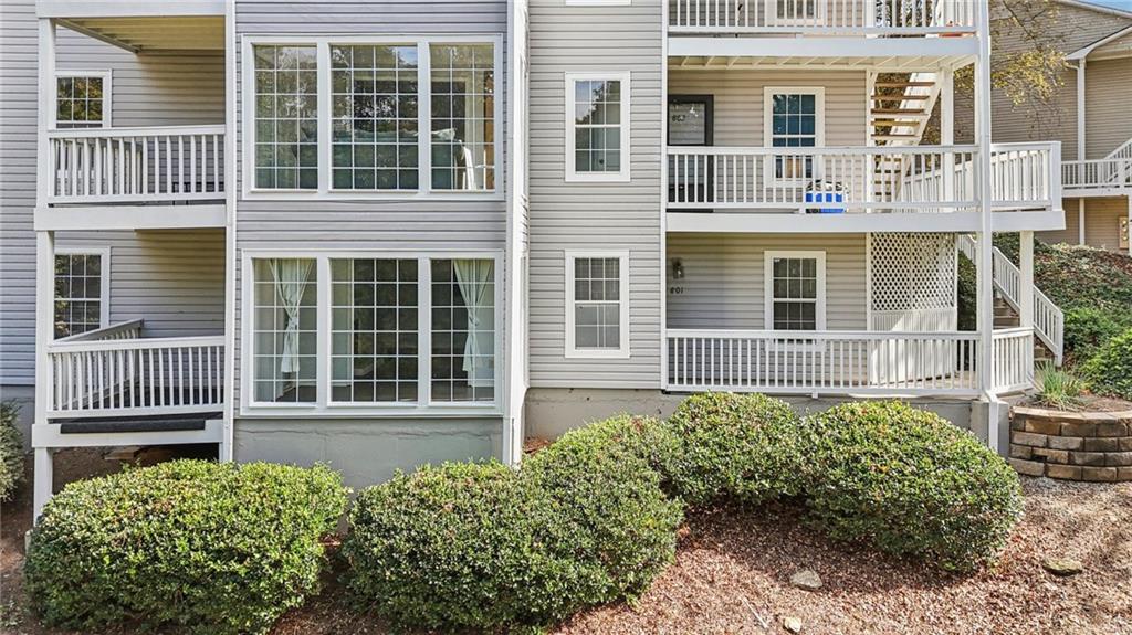 801 Countryside Place Smyrna, GA 30080 - Photo 25 of 34 a front view of a house with a garden