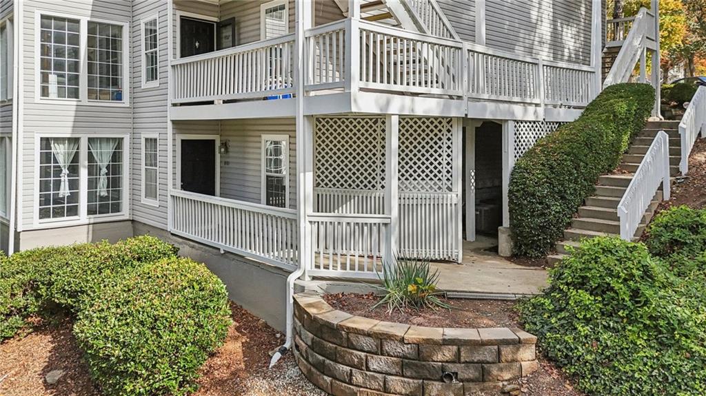 801 Countryside Place Smyrna, GA 30080 - Photo 26 of 34 a front view of a house with a garden