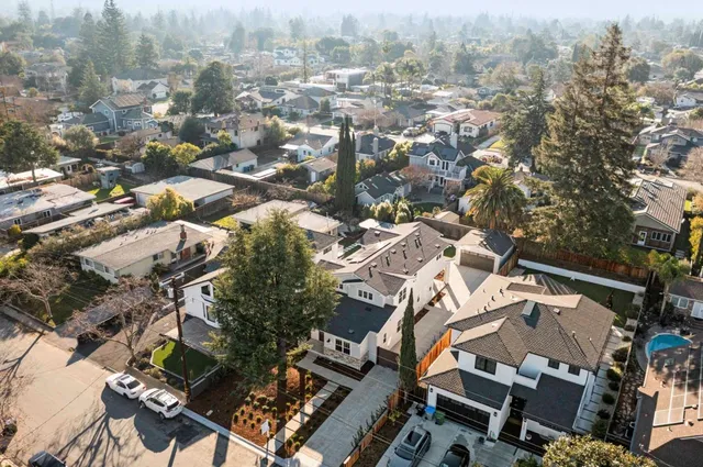 an aerial view of a city with lots of residential buildings
