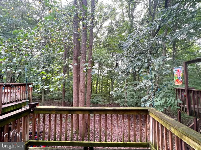 a bathroom with a sink vanity and mirror