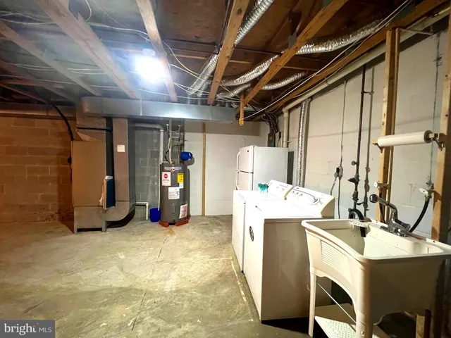 a view of empty room with wooden walls