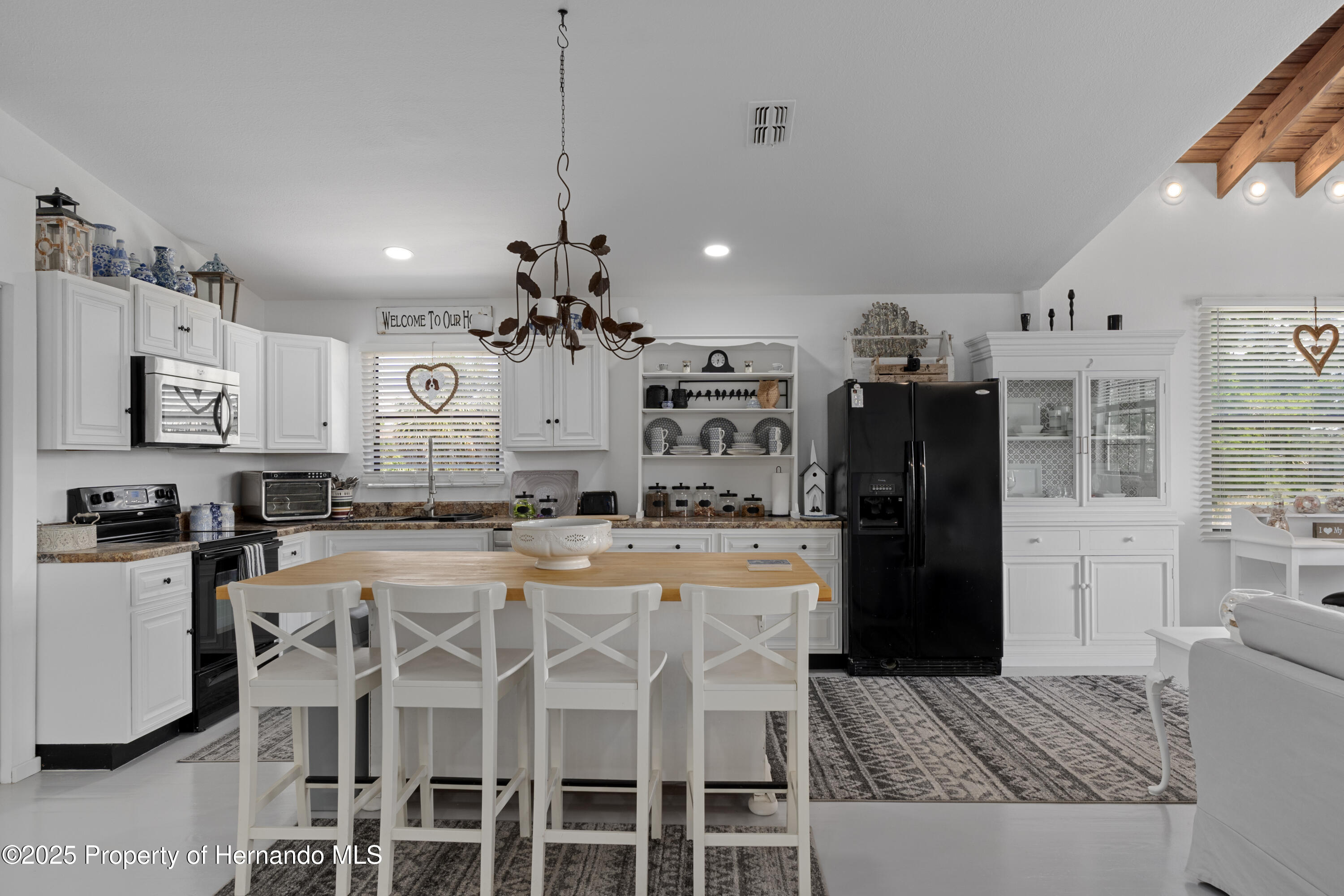 3216 Sea Grape Drive Hernando Beach, FL 34607 - Photo 13 of 39 Breakfast Bar / Island with Wood Countertop