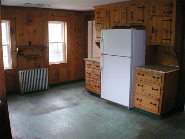 13 River Road Templeton, MA 01436 - Photo 6 of 16 a kitchen with cabinets and refrigerator