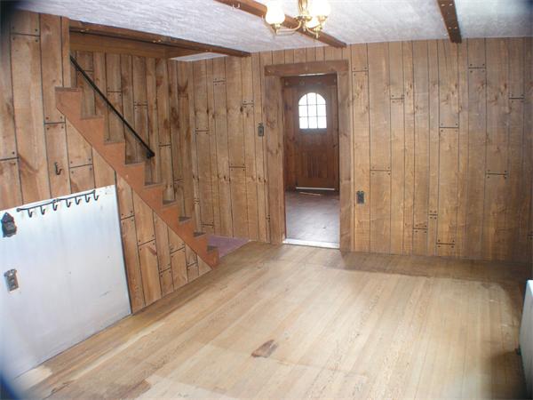13 River Road Templeton, MA 01436 - Photo 8 of 16 a view of a hallway with wooden floor and staircase
