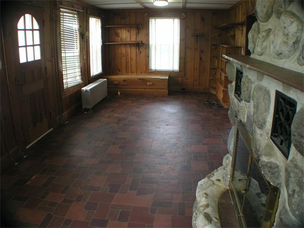 13 River Road Templeton, MA 01436 - Photo 10 of 16 a living room with furniture and a fireplace
