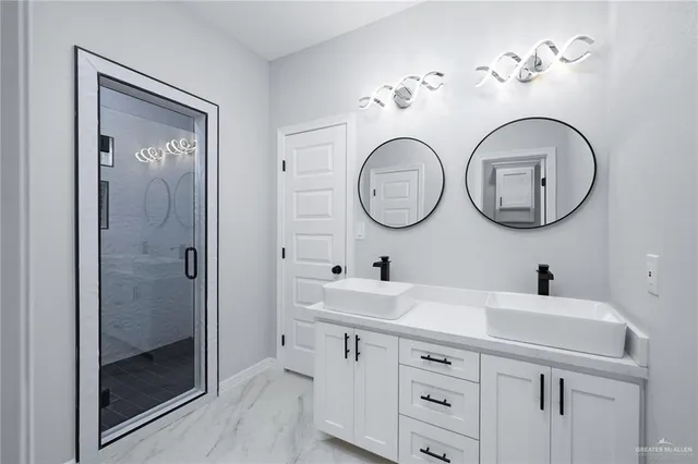 a view of an empty room and wooden floor