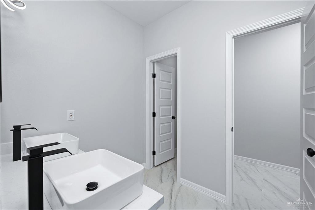 210 Bernie Rio Grande City, TX 78582 - Photo 13 of 20 a view of a bathroom with a sink