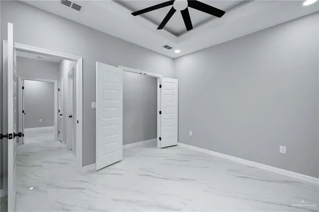 a view of an empty walk in closet
