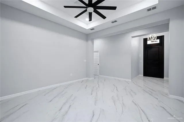 a view of kitchen with center island and stainless steel appliances