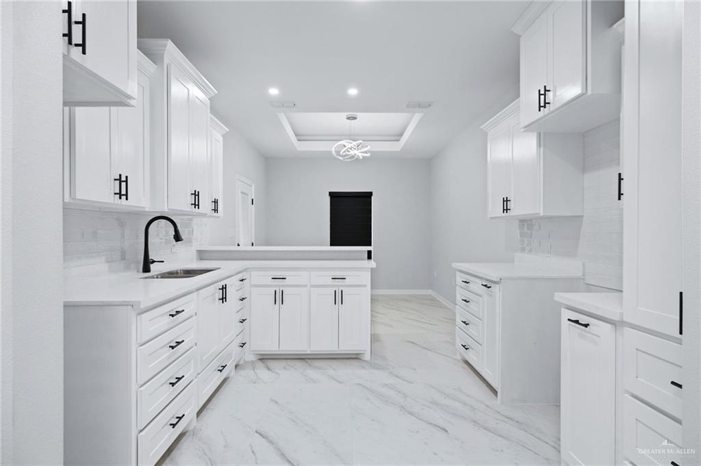 210 Bernie Rio Grande City, TX 78582 - Photo 7 of 20 a spacious bathroom with double sink and a mirror