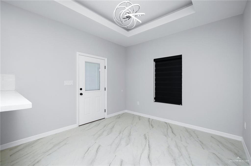 210 Bernie Rio Grande City, TX 78582 - Photo 10 of 20 wooden floor in an empty room