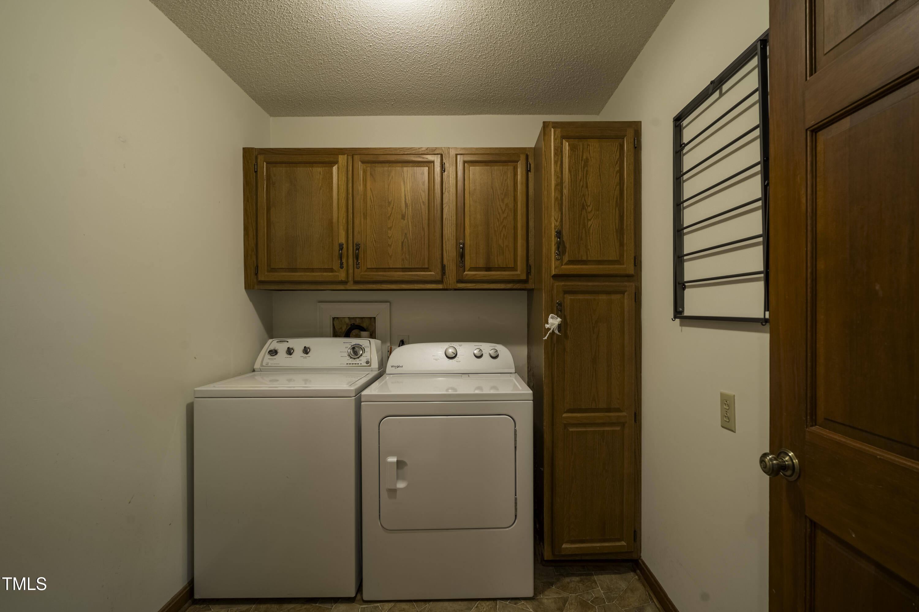 610 Denim Drive Erwin, NC 28339 - Photo 11 of 49 a utility room with dryer and washer