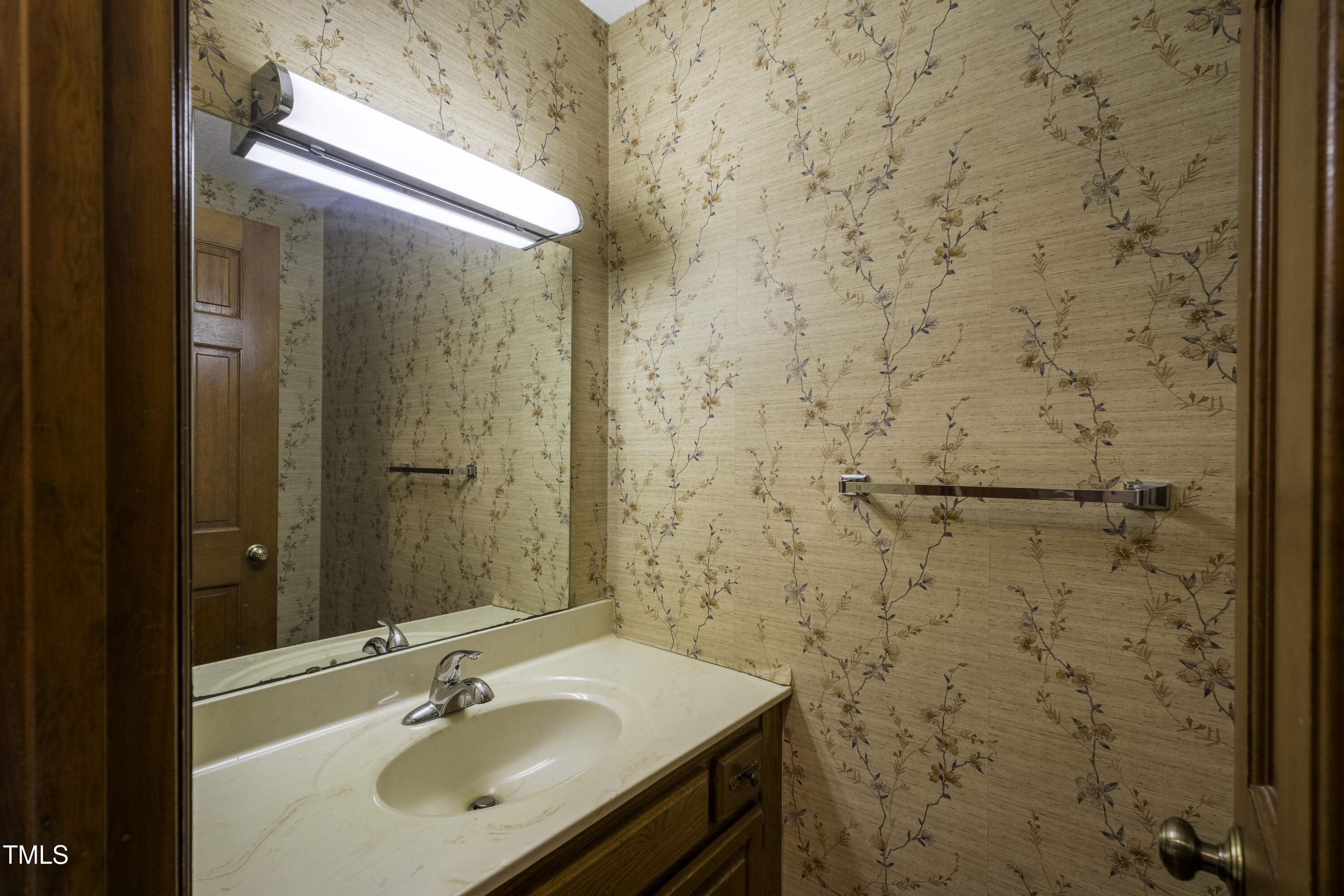 610 Denim Drive Erwin, NC 28339 - Photo 12 of 49 a bathroom with a sink and a mirror
