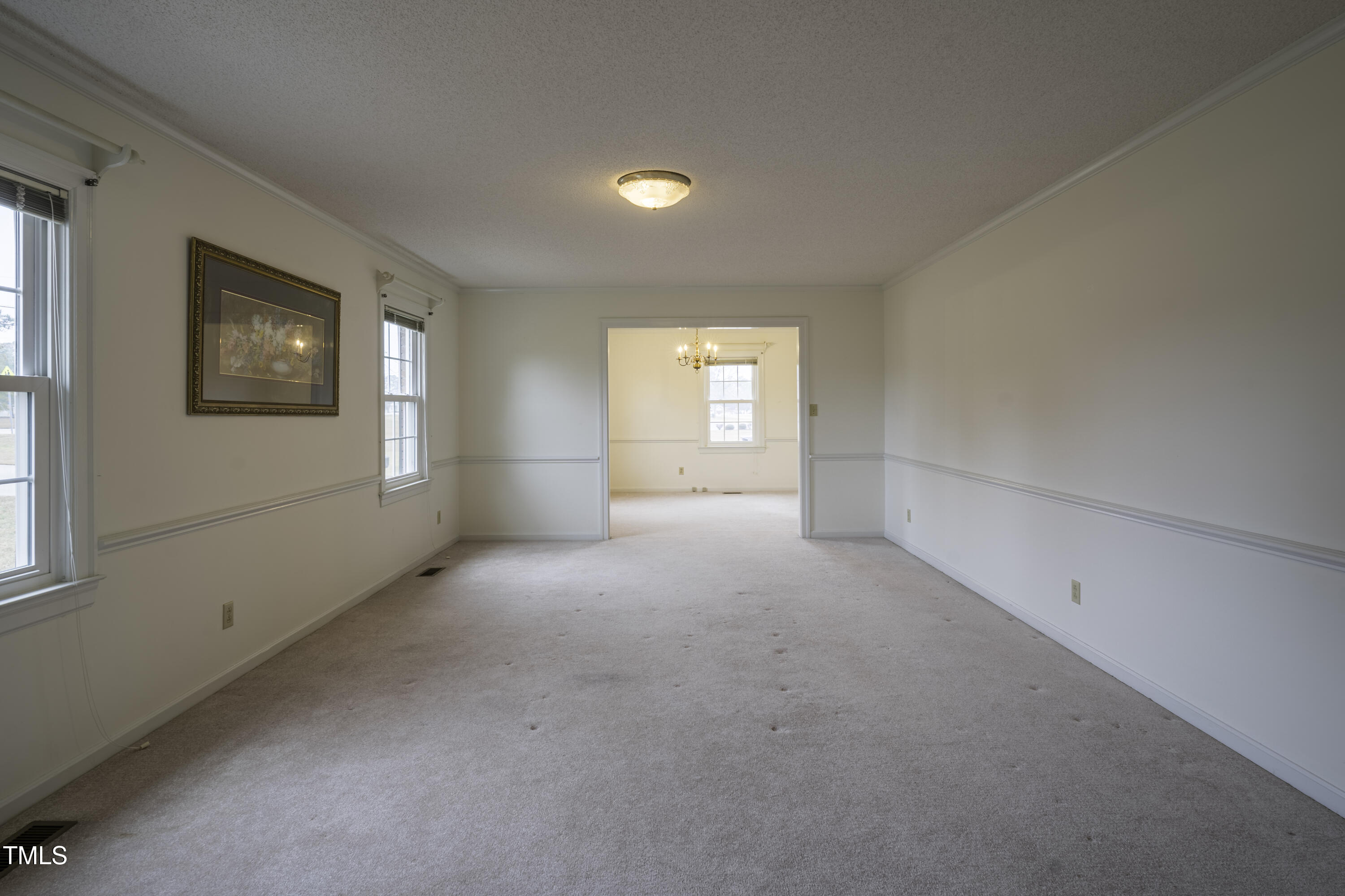610 Denim Drive Erwin, NC 28339 - Photo 15 of 49 a view of empty room with windows