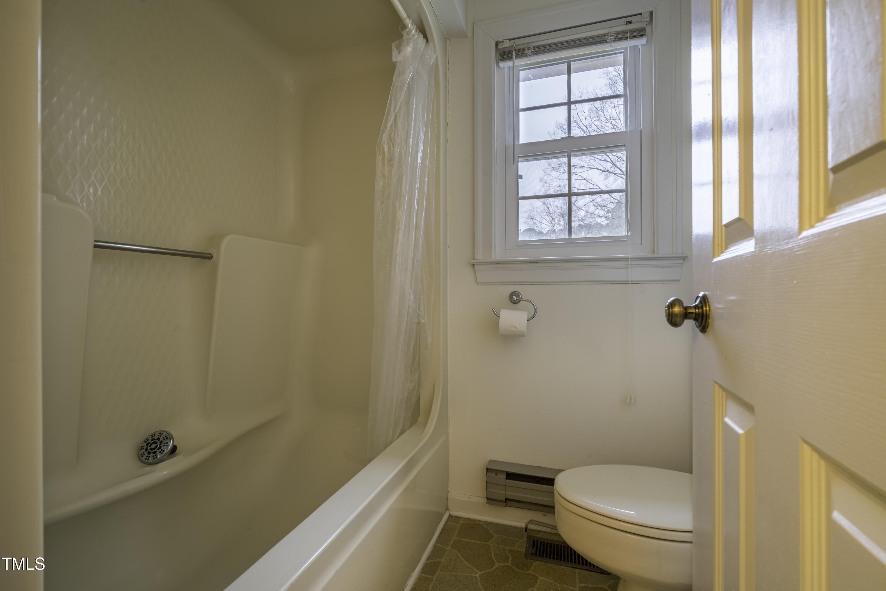610 Denim Drive Erwin, NC 28339 - Photo 36 of 49 a bathroom with a granite countertop toilet a sink and a bathtub