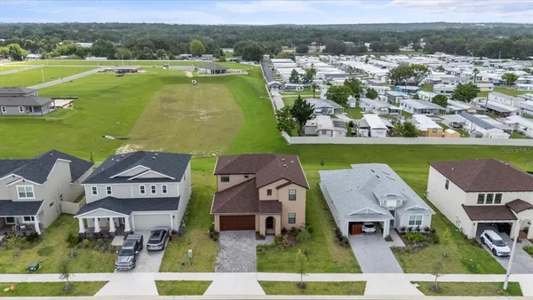 an aerial view of a house with a garden