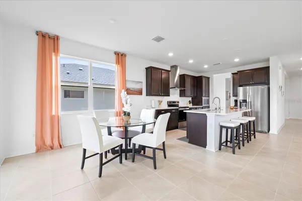 a view of a dining room kitchen and a window