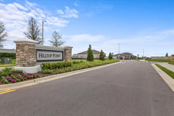 a view of a street with a building and couple of street view