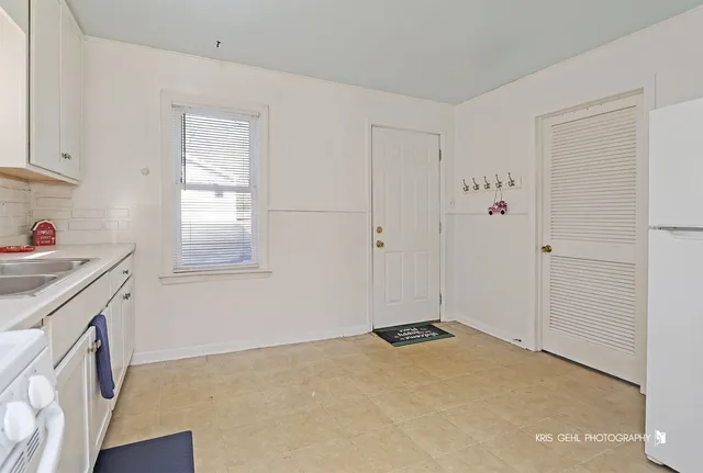 a view of a storage & utility room with closet