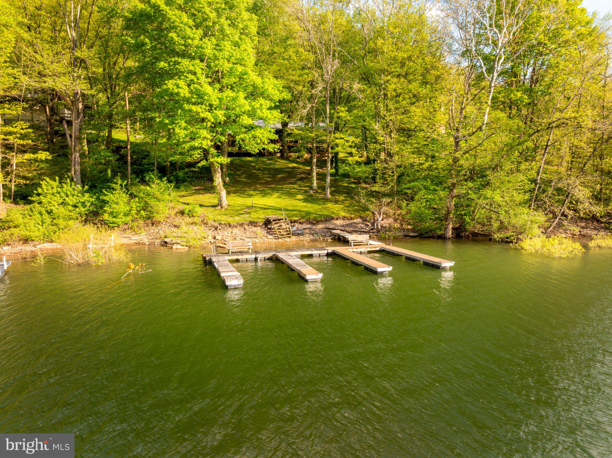 750 Lake Side Road Addison, PA 15411 - Photo 8 of 51 Serene lakeside retreat with docks.