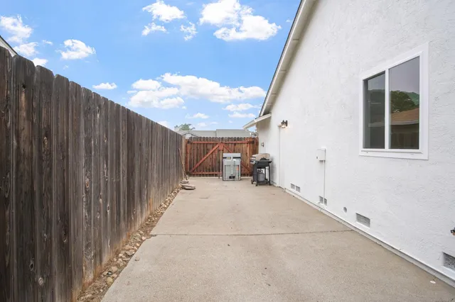 front view of a house with a street