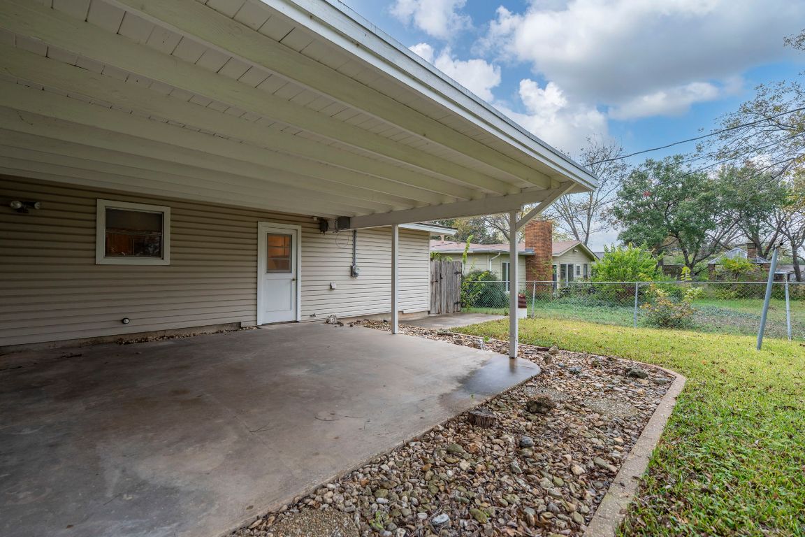 1800 Barbara Street Austin, TX 78757 - Photo 7 of 37 a view of a house with a backyard