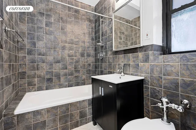 a kitchen with a stove and a sink