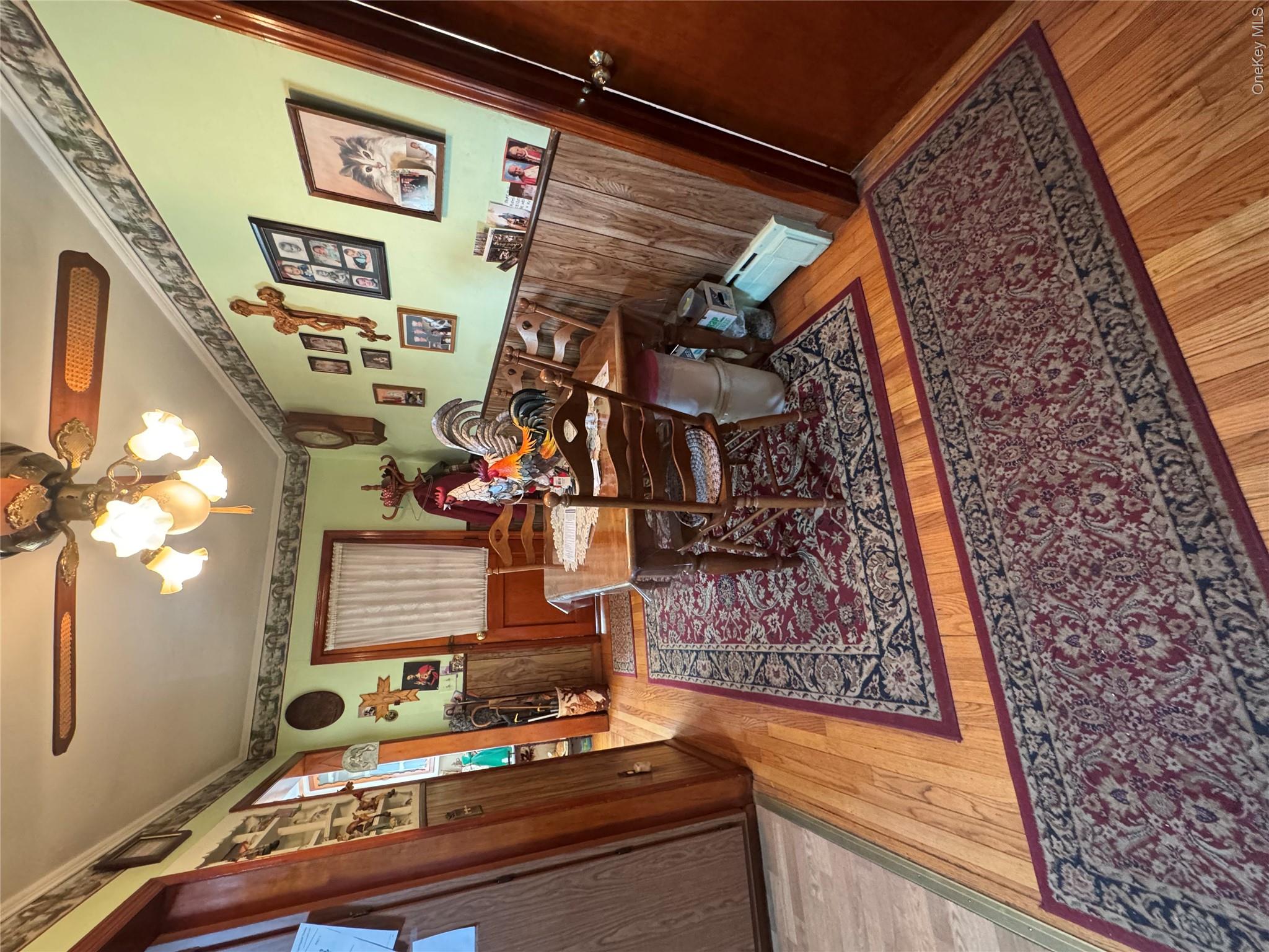 367 Mt Eve Road Goshen, NY 10924 - Photo 16 of 37 a living room with furniture and a rug