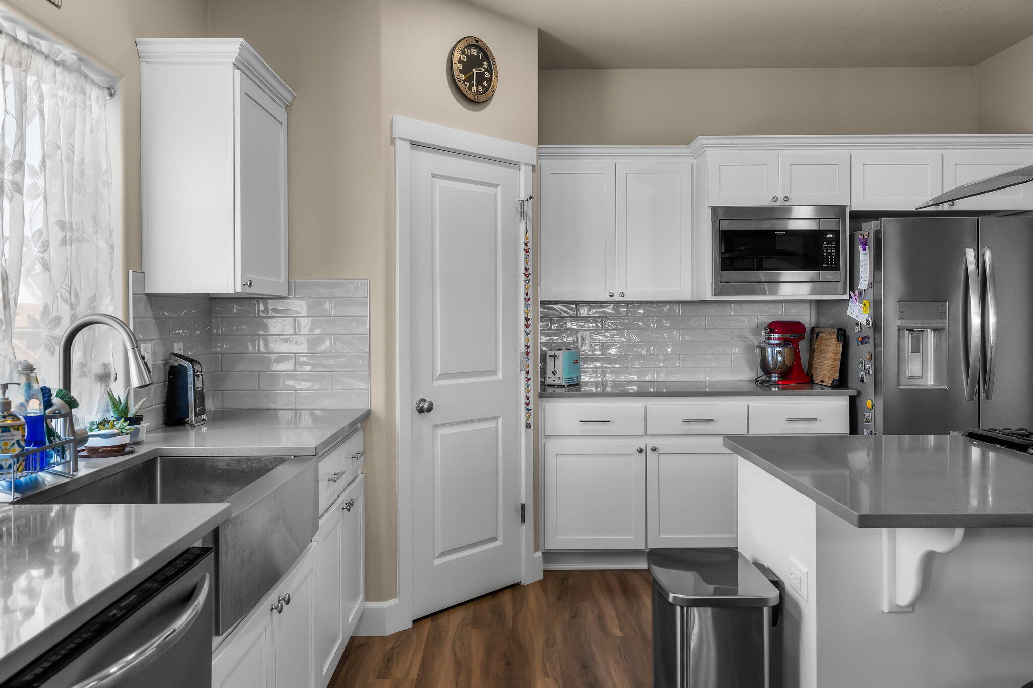 1132 Northwest Golf Course Drive Madras, OR 97741 - Photo 7 of 36 a kitchen with stainless steel appliances granite countertop a sink stove and refrigerator